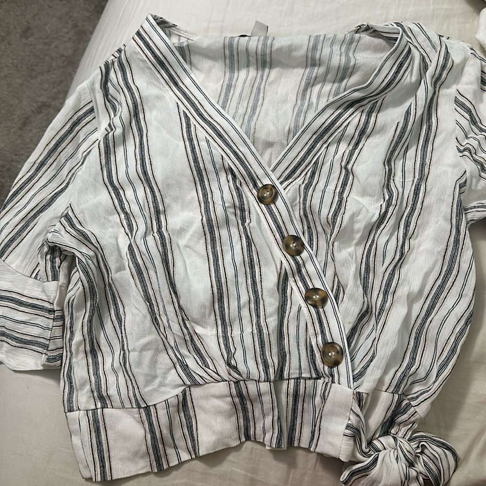 never worn cute button down cut down the middle